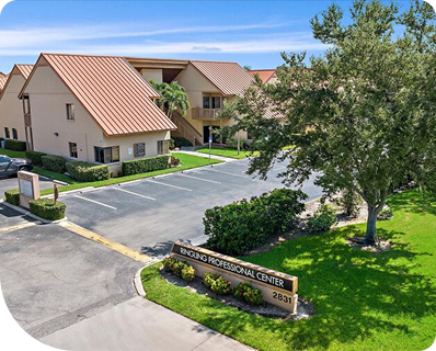 Aerial view of the office buildings and on-site parking